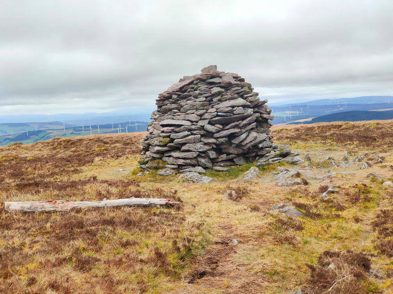 Mound of stones marking the Highest point of Musheramore Mountain