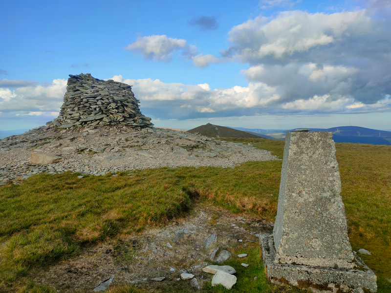 Trig Pillar and mound of stones on The Paps West