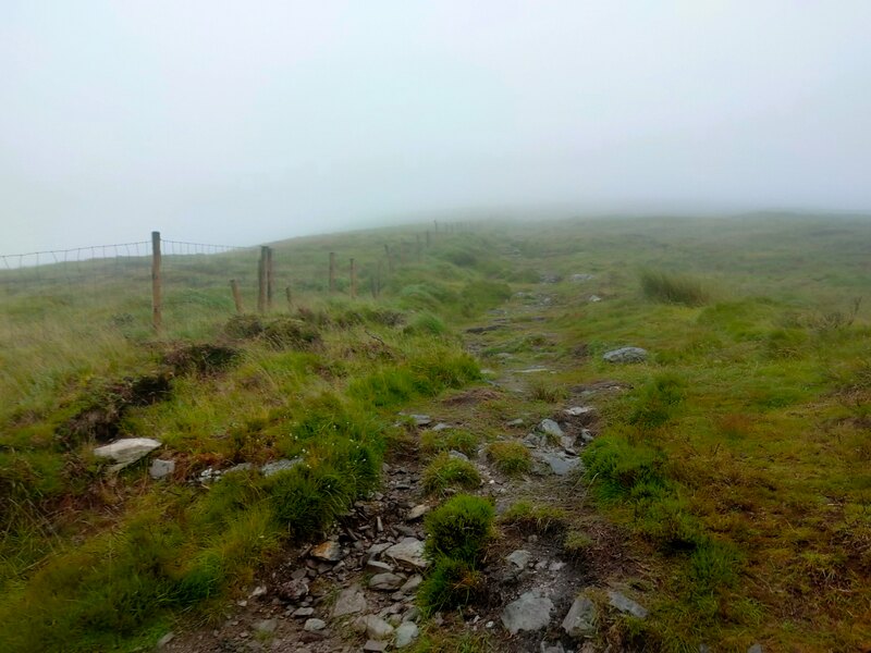 Mountain path with very low cloud