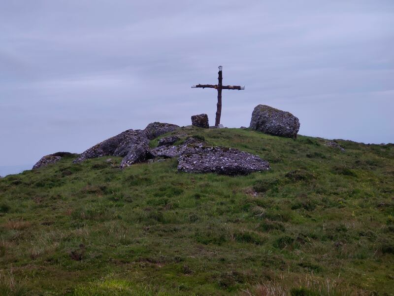 Timber cross on top of Seefin. Trig pillar knocked horizontal.