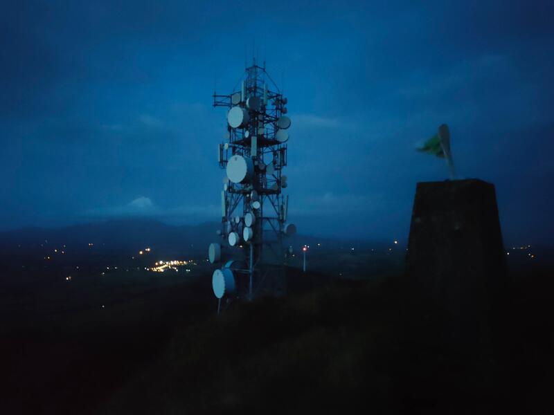 Trig Pillar and communication tower of Slievereaghafter dark