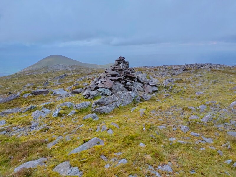 Small pile of stones marking the top of Purple Mountain Northeast