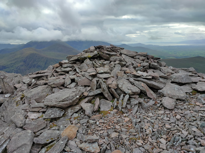 Pile of stones on the top of Tomies Mountain