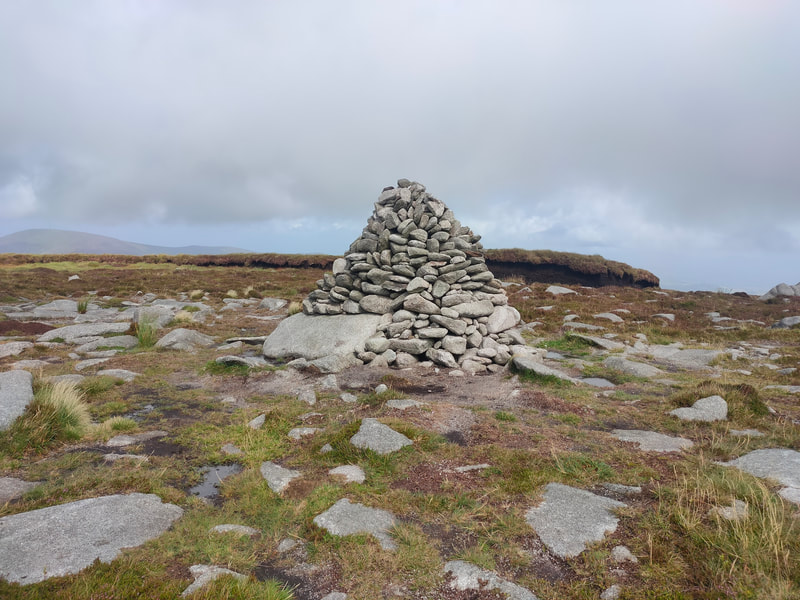 Triangular shaped mound of stone marks the top of Blackstairs 
