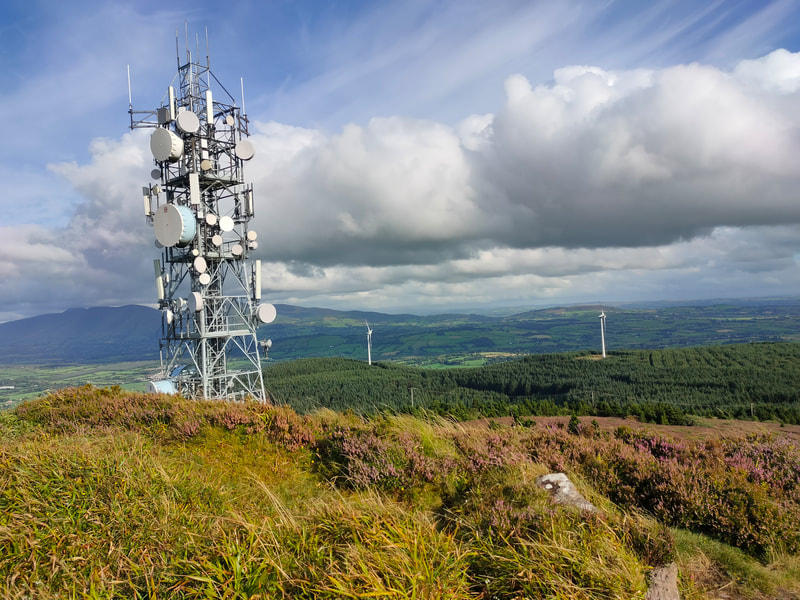 Slievereagh Communication Mast and the two wind turbines on its lower slope