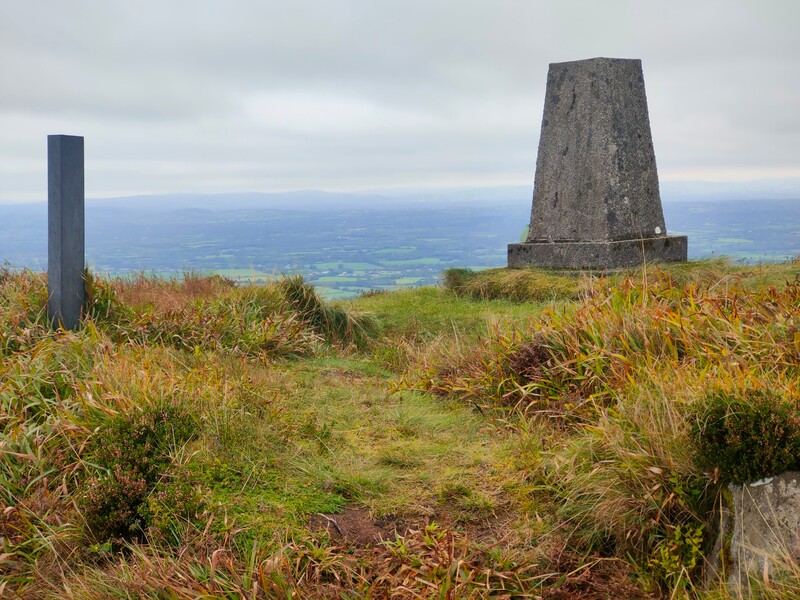 Trig Pillar of Slievereagh with black marker post close by