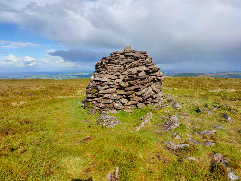 Large pile of stones marking the high point of Musheramore