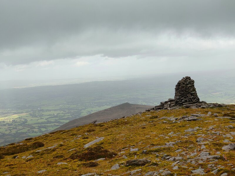 A pillar of stone at the top of Cnoc an Bhráca