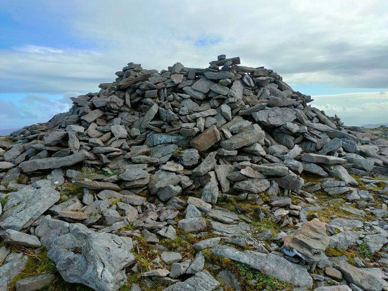 Large pile of stones on top of Purple Mountain
