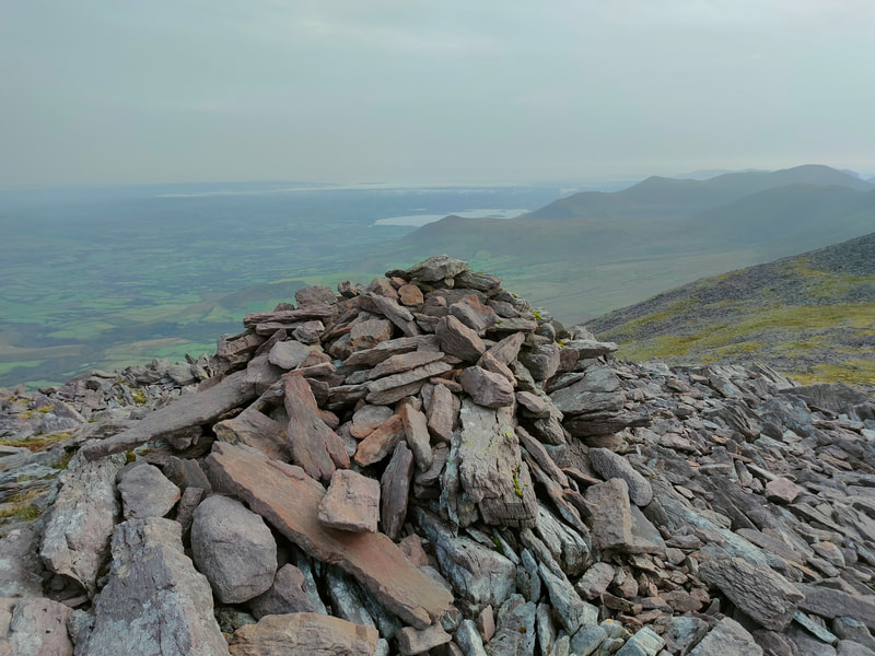 Large mound of stones on mountain top