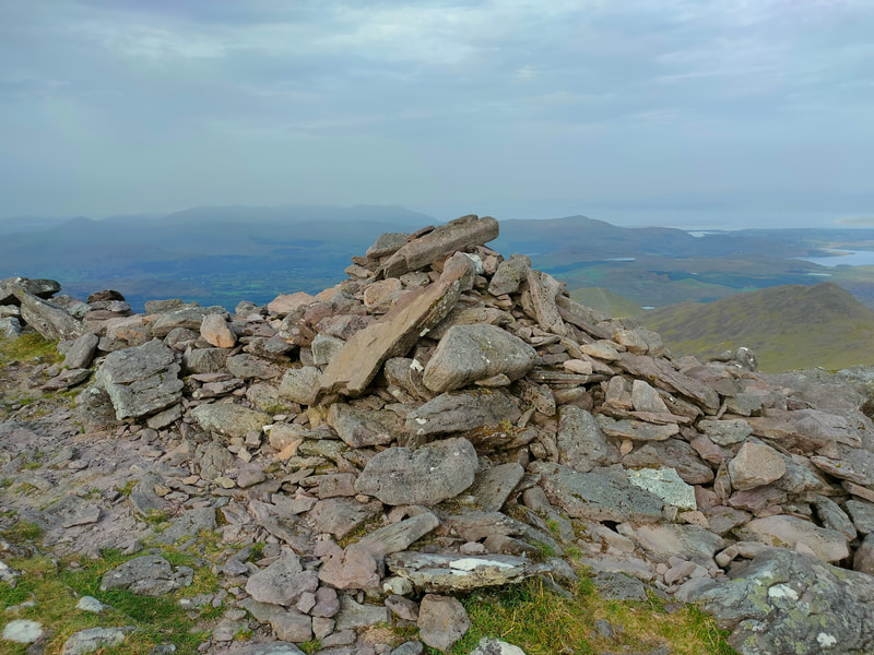 Pile of stones marking the top of Beenkeragh