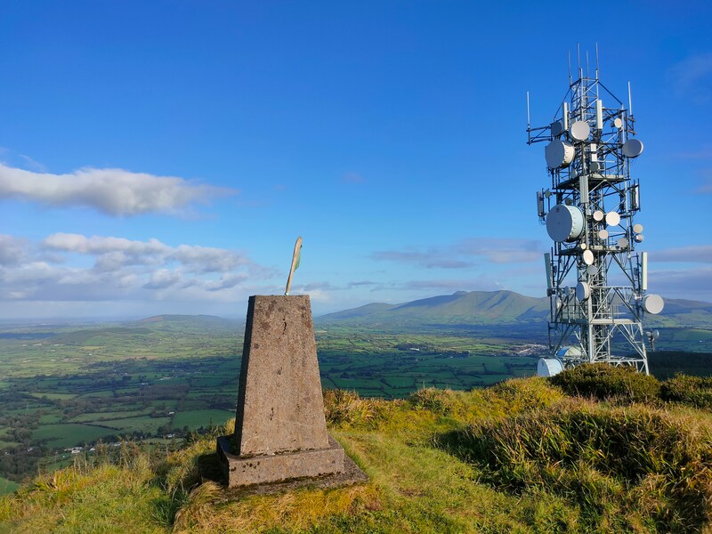 Slievereagh Trig Pillar and Mast with the Galty mountains in the background