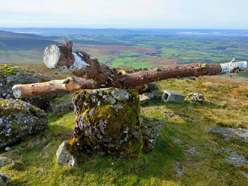 Rough timber cross (knocked) on mountain top 